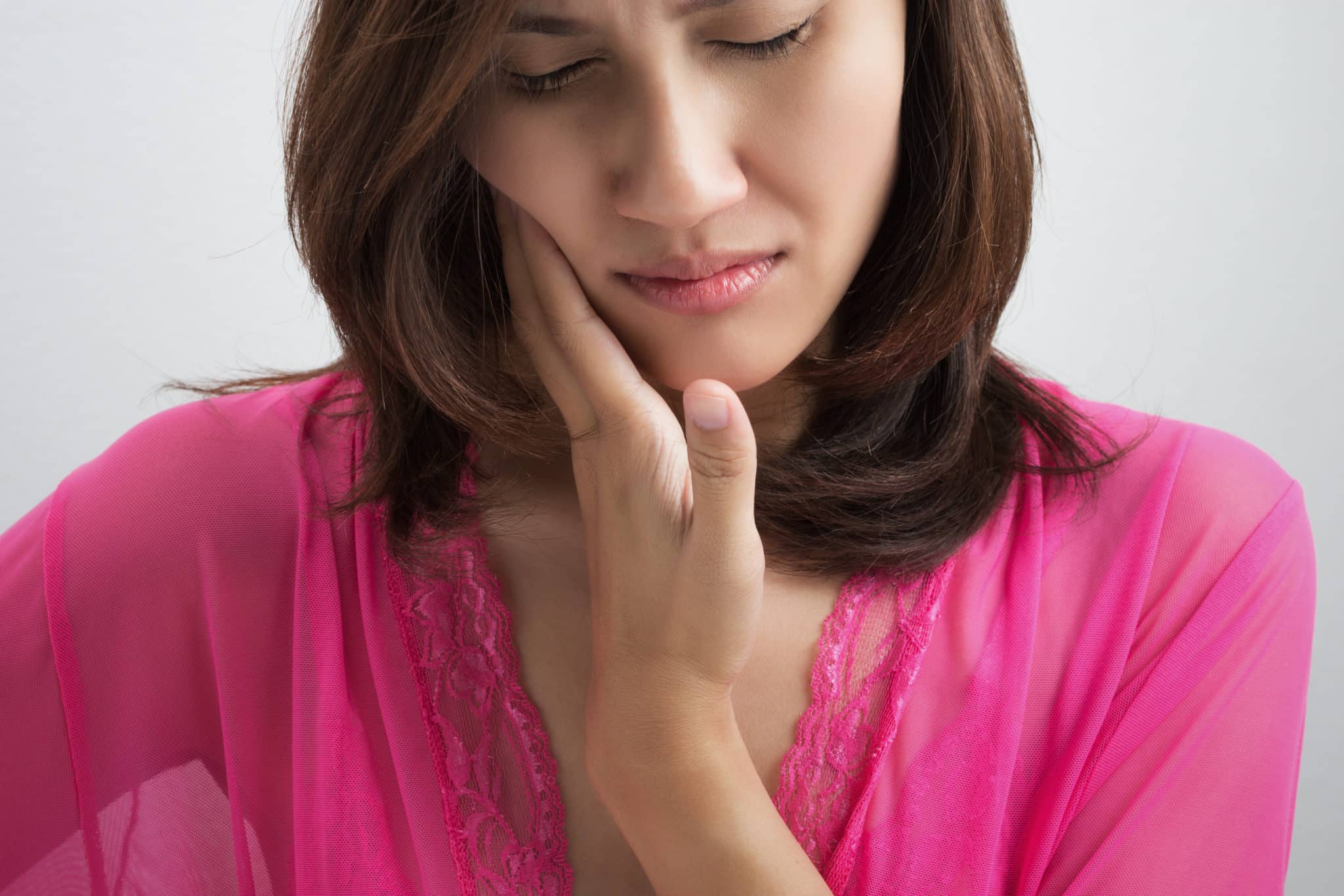 woman in pink top needs urgent care
