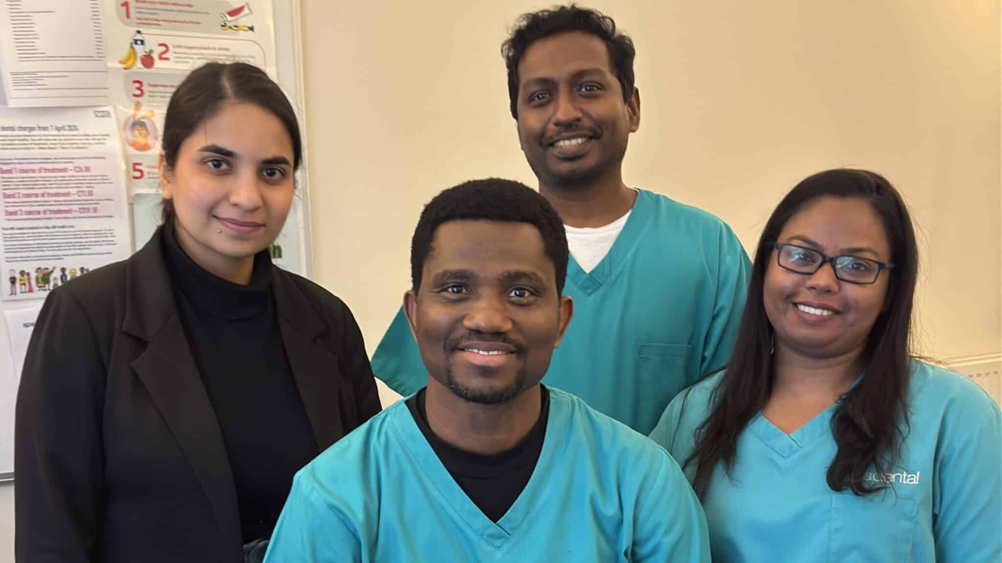 Four key team members of SpaDental Whitchurch November 2024. Practice manager in a black suit. The surgery team in scrubs.