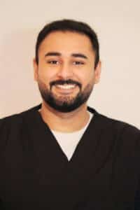 portrait of dentist Sekandar Khan Tewkesbury